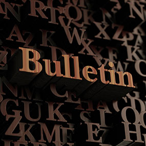 Wood letters spelling out "Bulletin"