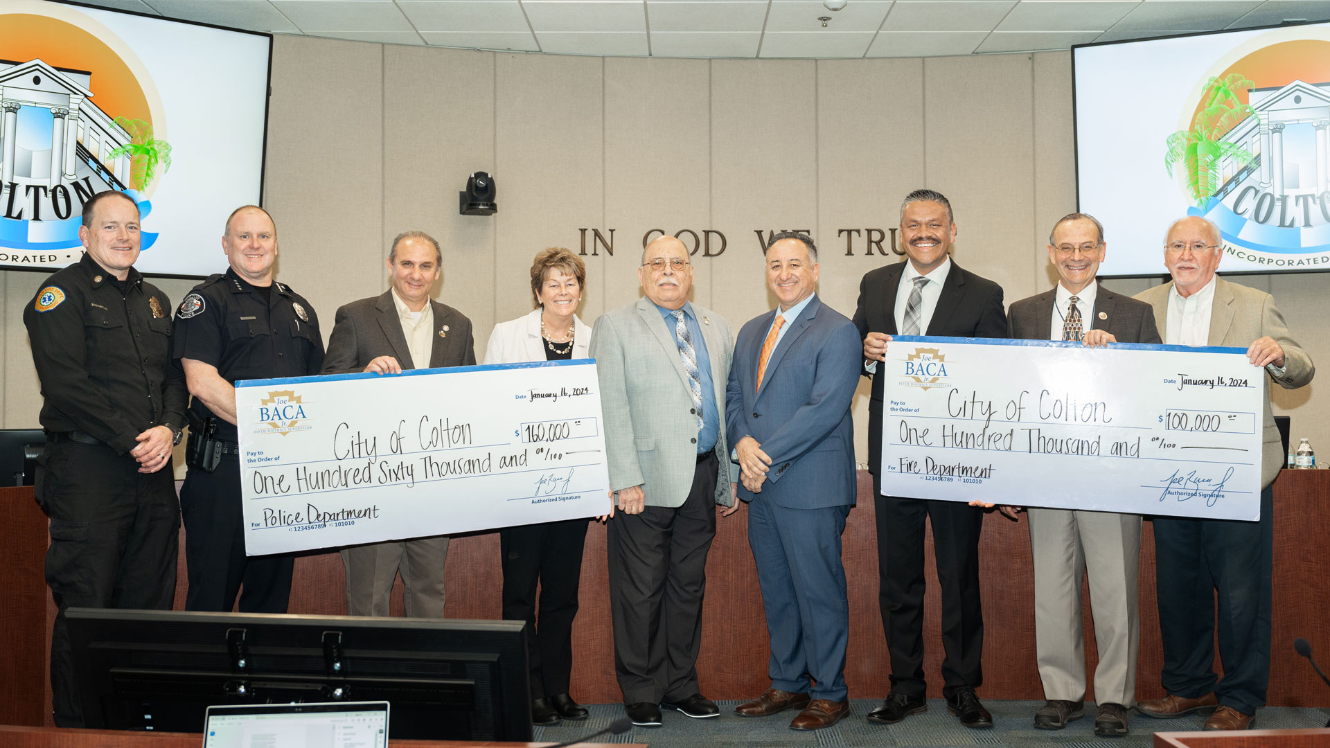 Supervisor Baca, Jr with representatives from the City of Colton at a check presentation ceremony
