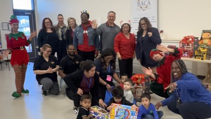 Supervisor Joe Baca, Jr. with Diane Higuchi of DAO Group, Arlene Molina of Preschool Services, and Mill Street Representatives at Pre-school Toy Giveaway.