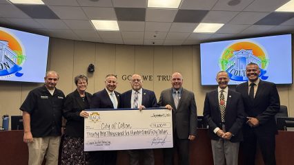 Supervisor Baca, Jr. presenting $31,000 check to Colton City Council for the Elizabeth Davis Park batting cages and baseball fields.